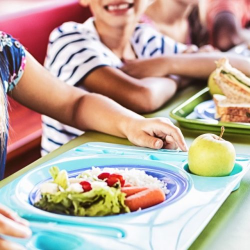 Children eating at the canteen at school